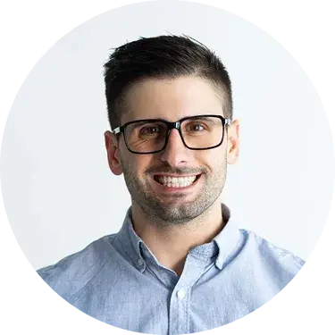 A smiling man with dark hair